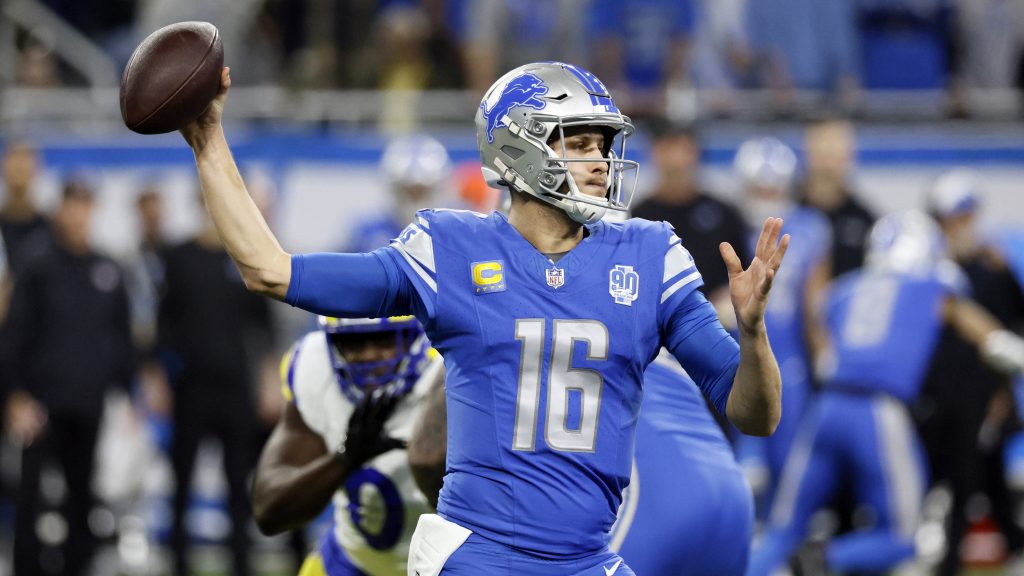 Detroit Lions quarterback Jared Goff throws during the first half of an NFL wild-card playoff football game against the Los Angeles Rams, Sunday, Jan. 14, 2024, in Detroit.