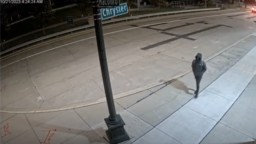 A screenshot of surveillance video shows the suspect, believed to be Michael Jackson-Bolanos, at the intersection of Macomb and Chrysler around 4:23 a.m. on Oct. 21, 2023.