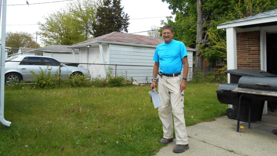 High point enthusiast Dennis Stewart searched for Detroit's highest natural point in 2017, leading him to a resident's backyard.