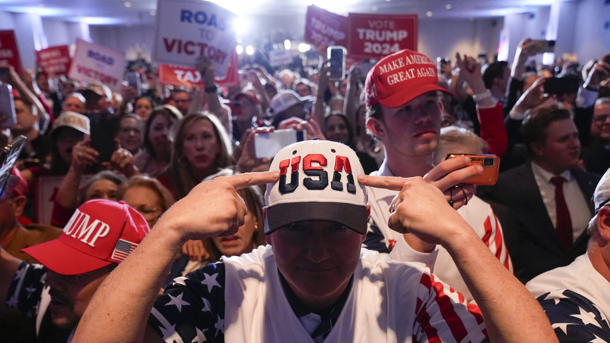 Supporters cheer as Republican presidential candidate former President Donald Trump speaks at a primary election night party at the South Carolina State Fairgrounds in Columbia, S.C., Saturday, Feb. 24, 2024.