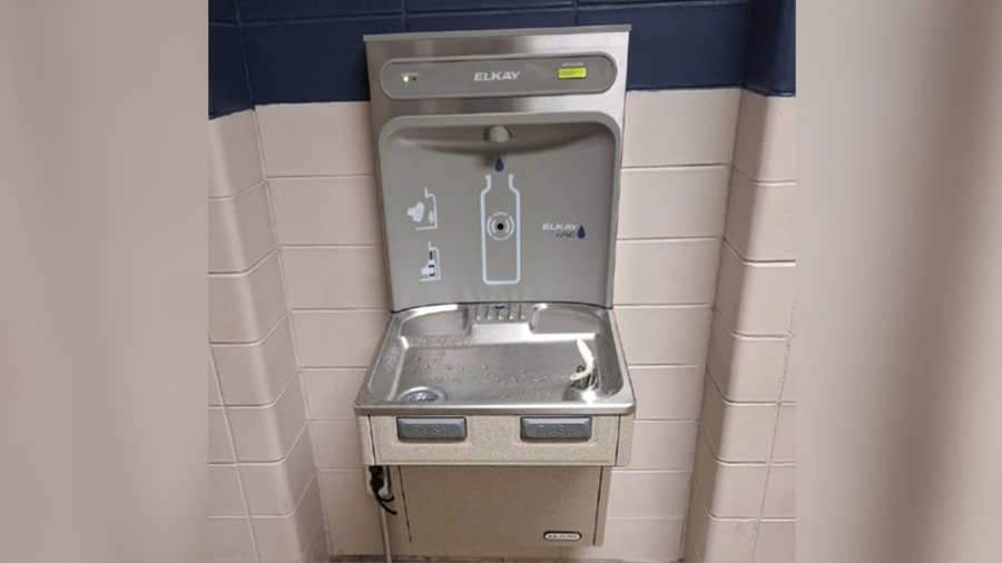 A filtered water fountain and bottle filling station in a school.