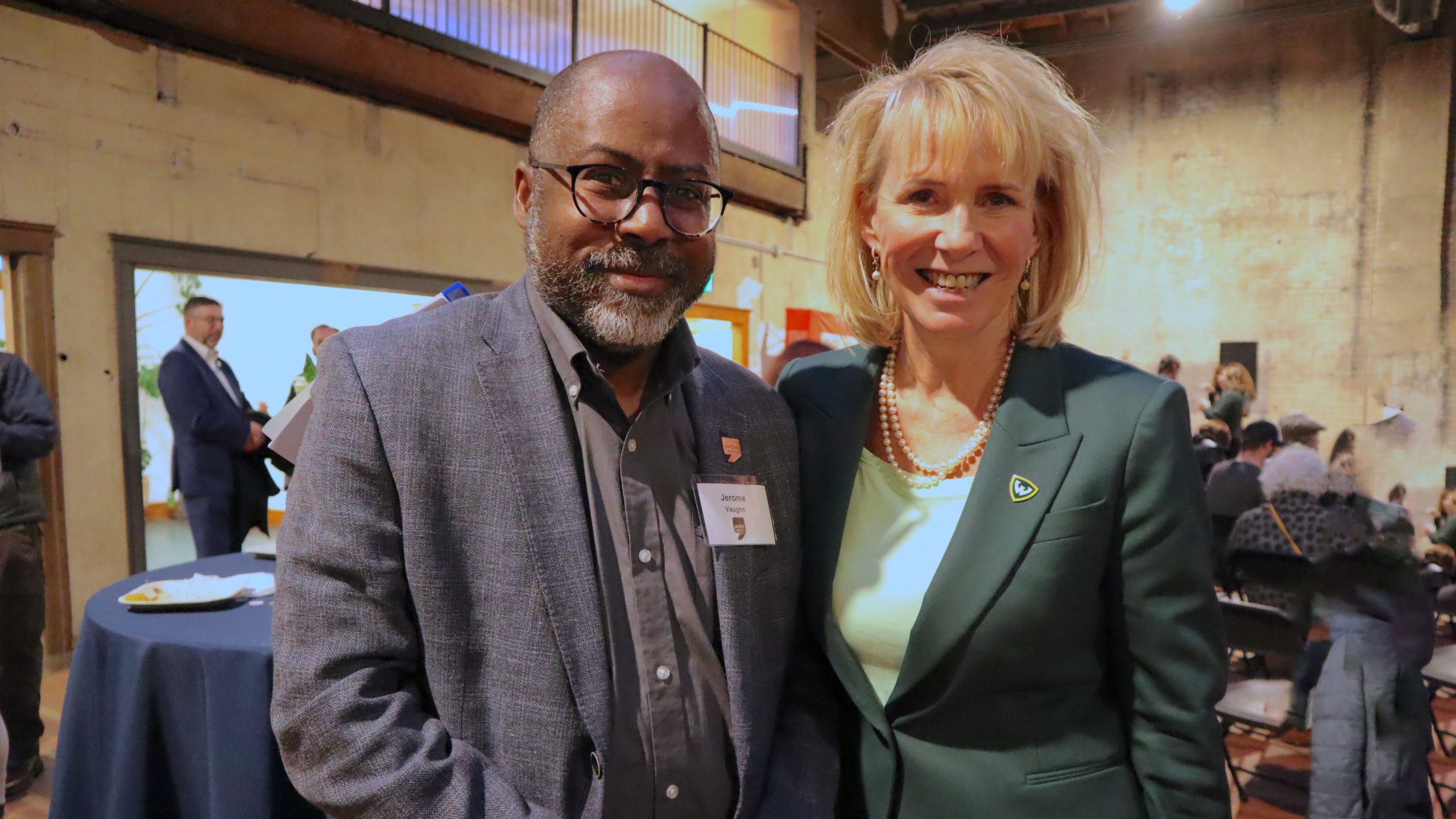 WDET News Director Jerome Vaughn (left) and Wayne State University President Kimberly Espy.
