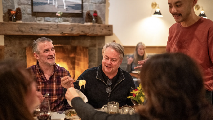 Alpino manager Thomas Chen, right, talks with Eddie Gillis, center, of Flat Rock, and Tom Duffy, left, of Milford as they dine with their wives Wendy Duffy, foreground left, and Angie Gillis at Alpino in Detroit’s Corktown neighborhood on Friday, Feb. 16, 2024.