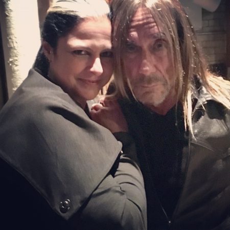 Ann Delisi (left) poses for a photo with Michigan rock hall of famer Iggy Pop during the premiere of "Gimmie Danger" at the Detroit Film Theatre on Oct. 25, 2016, in Detroit.