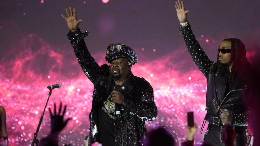 George Clinton, left, and Quavo perform onstage at the 2024 Recording Academy Honors presented by The Black Music Collective in Los Angeles Thursday, Feb. 1, 2024. (AP Photo/Damian Dovarganes)
