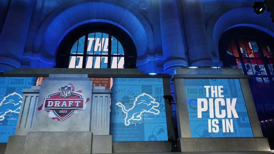 FILE - The onstage video screens display "The Pick Is In" for the Detroit Lions during the 2023 NFL Draft, Thursday, April 27, 2023, in Kansas City, Mo.