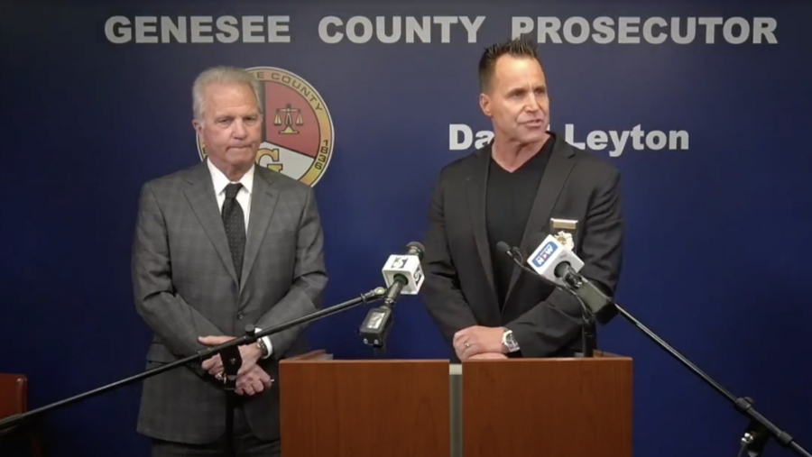 Genesee County Prosecutor David Leyton, left, speaks alongside Genesee County Sheriff Chris Swanson during a press conference at Genesee County Prosecutor's office in Flint, Mich., on Tuesday, March 19, 2024, announcing Congressman Dan Kildee's brother has been murdered in Vienna Township on Tuesday morning.