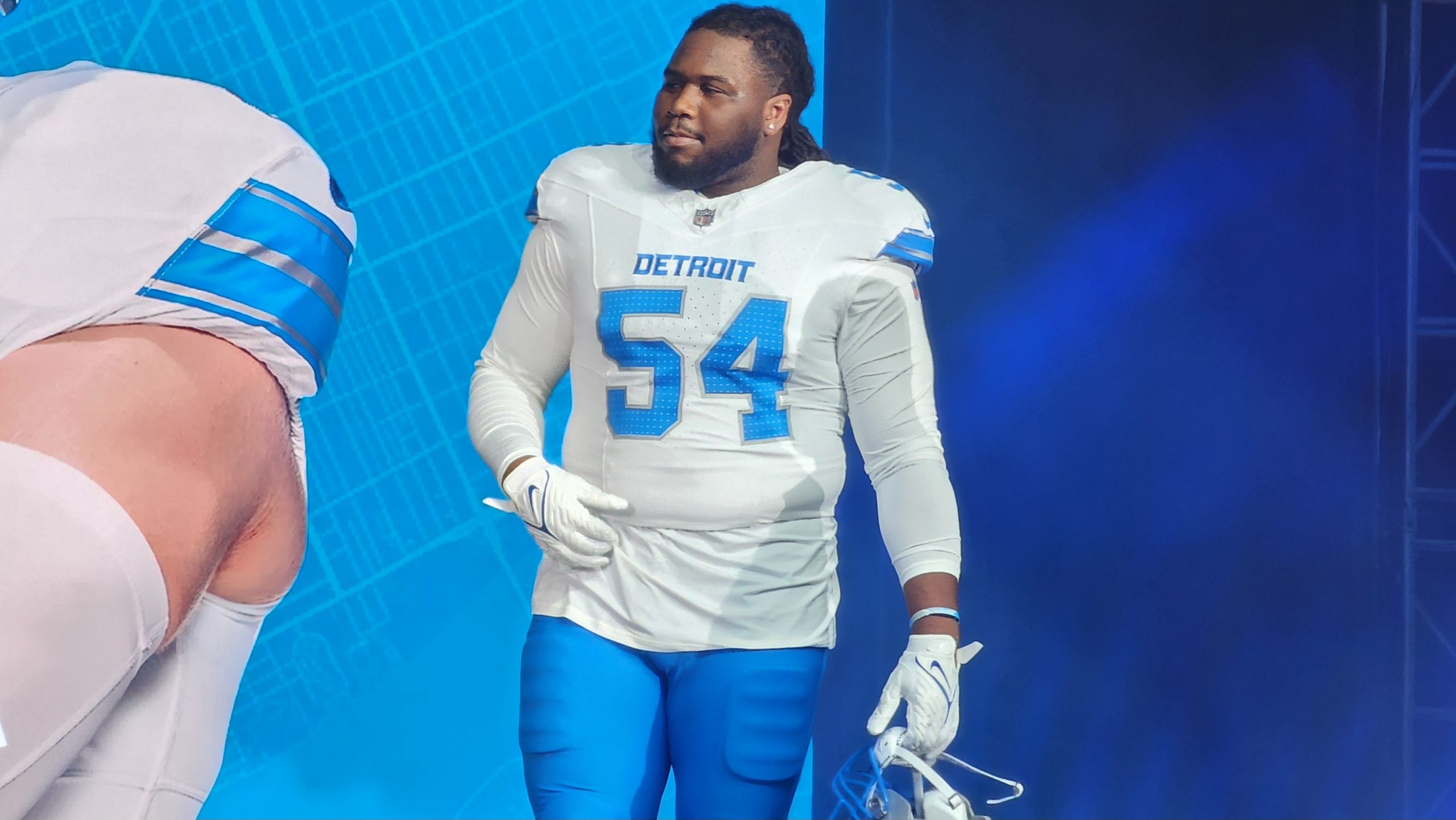 Detroit Lions defensive tackle Alim McNeil models the team's redesigned away uniform at Ford Field in Detroit on April 18, 2024.