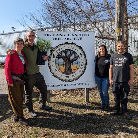 Kinga Osz-Kemp (from left) and Birch Kemp, founders and co-directors of Arboretum Detroit, stand outside the Archangel Ancient Tree Archive in Copemish, Mich, with Archangel team members Caryssa Rouser and Jesse Ketchum.
