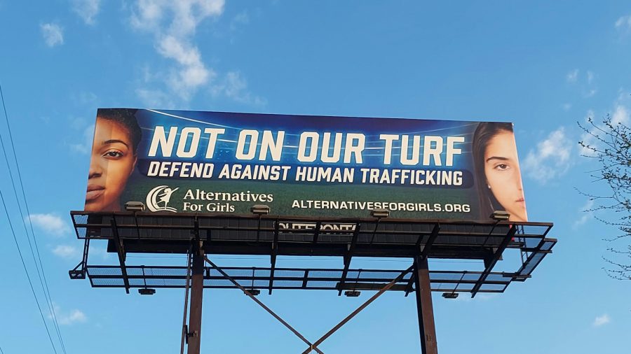 Billboard in Detroit raising human trafficking awareness ahead of the NFL Draft.