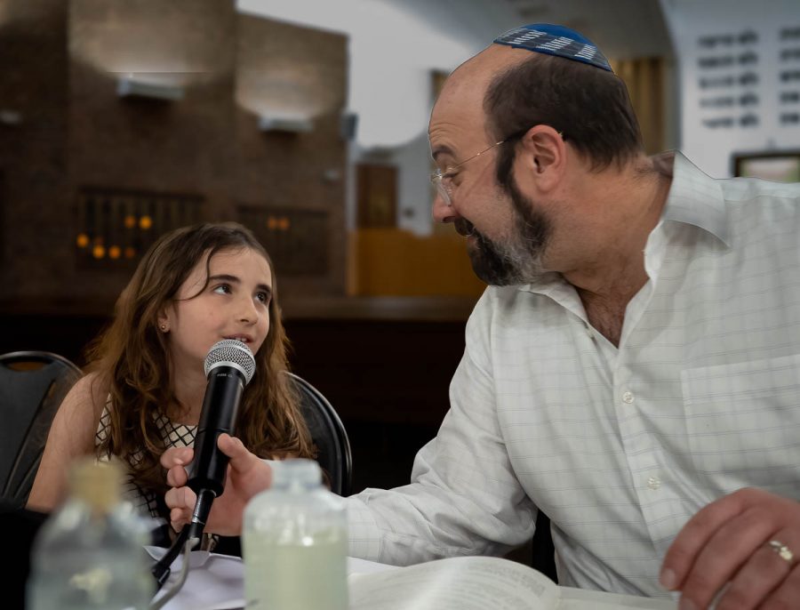 Rabbi Matt Zerwekh (right) leads a Passover Seder at Temple Emanu-El in Oak Park on Tuesday, April 23, 2024.