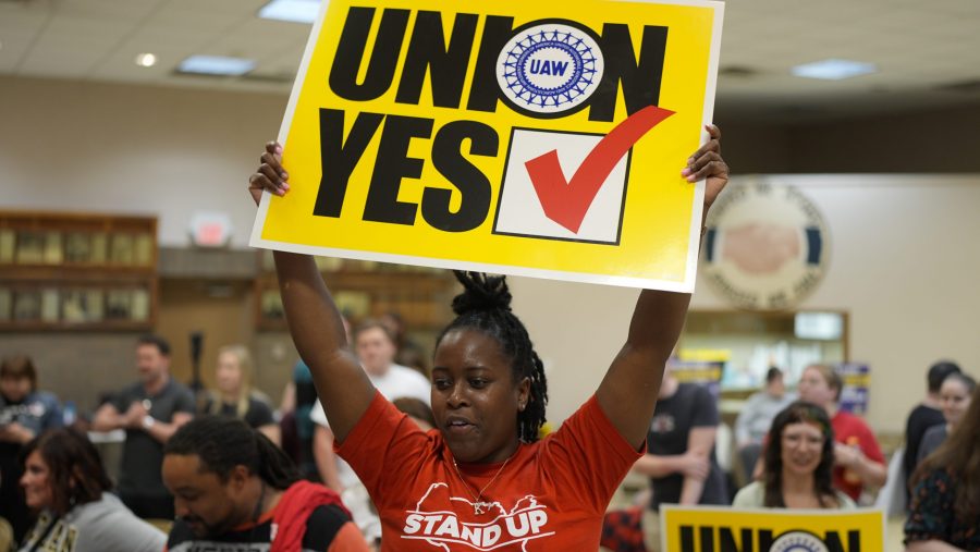 Volkswagen automobile plant employee Kiara Hughes celebrates after employees voted to join the UAW union Friday, April 19, 2024, in Chattanooga, Tenn.