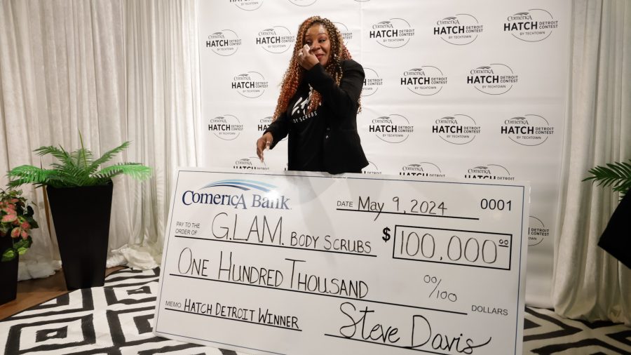 G.L.A.M. Body Scrubs owner Tiffany Cartwright brought to tears after winning the $100,000 grand prize from Comerica Hatch Detroit on Thursday, May 9, 2024, at the Wayne State University Industry Innovation Center in Detroit.
