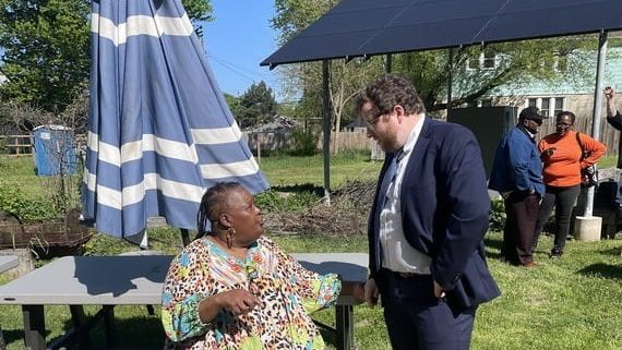 EGLE's Chief Climate Officer Cory Connolly speaks with Tammy Black, Detroit resident and CEO of Communities Power, an organization dedicated to bringing affordable solar energy to low-income communities.