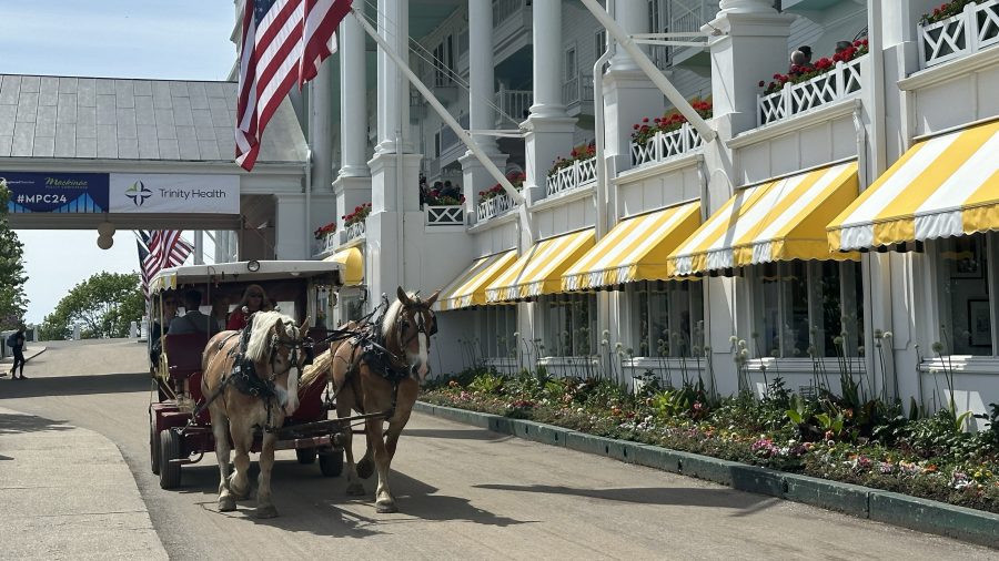 A horse carriage in front of the Grand Hotel on Mackinac Island.
