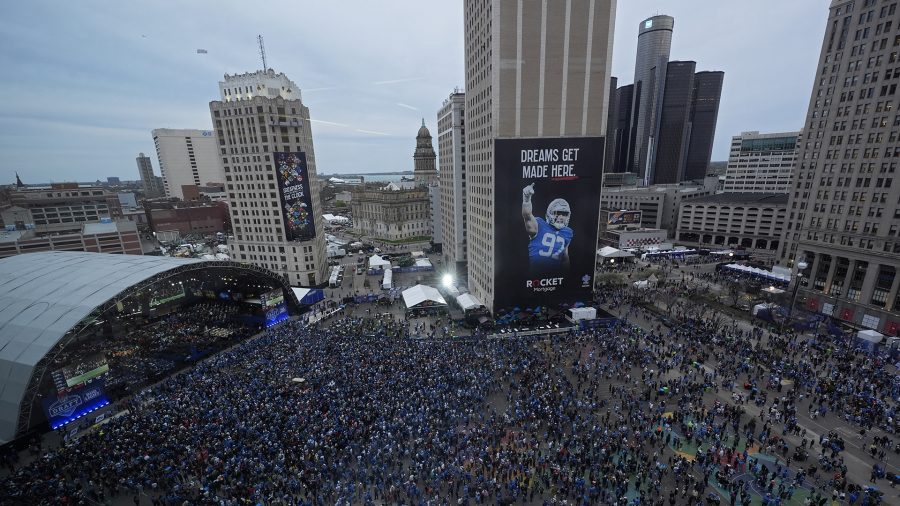 Crowds watch during the second round of the NFL football draft, Friday, April 26, 2024, in Detroit.