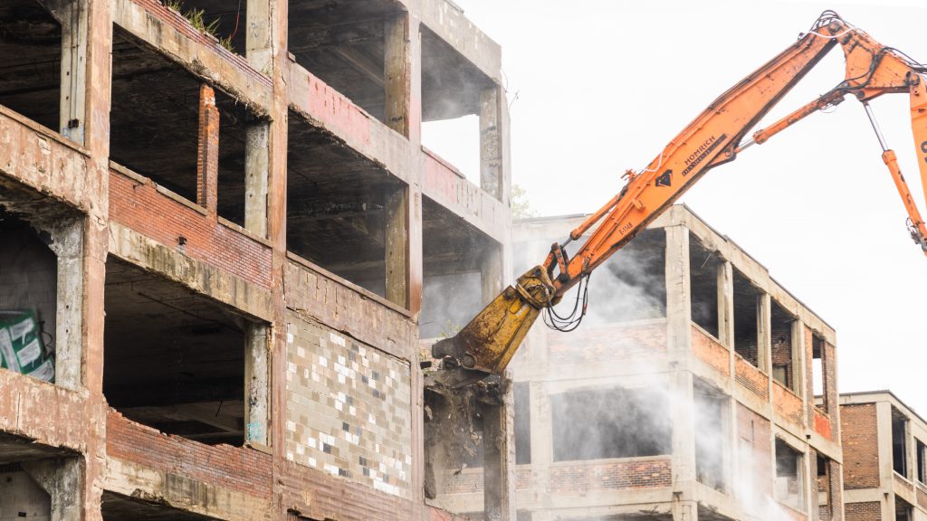 Crews work on demolishing the former Packard Plant building in Detroit.