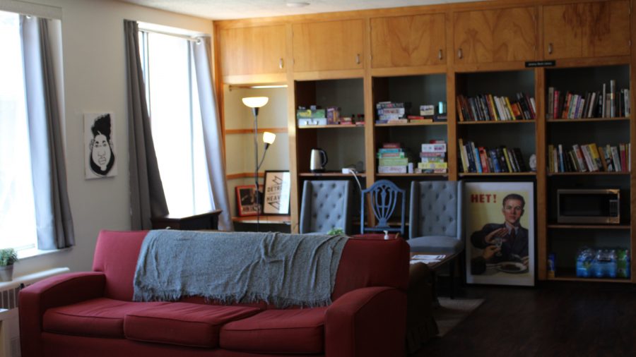 A space for community members going through the recovery process to use. The room includes a couch, windows and books.