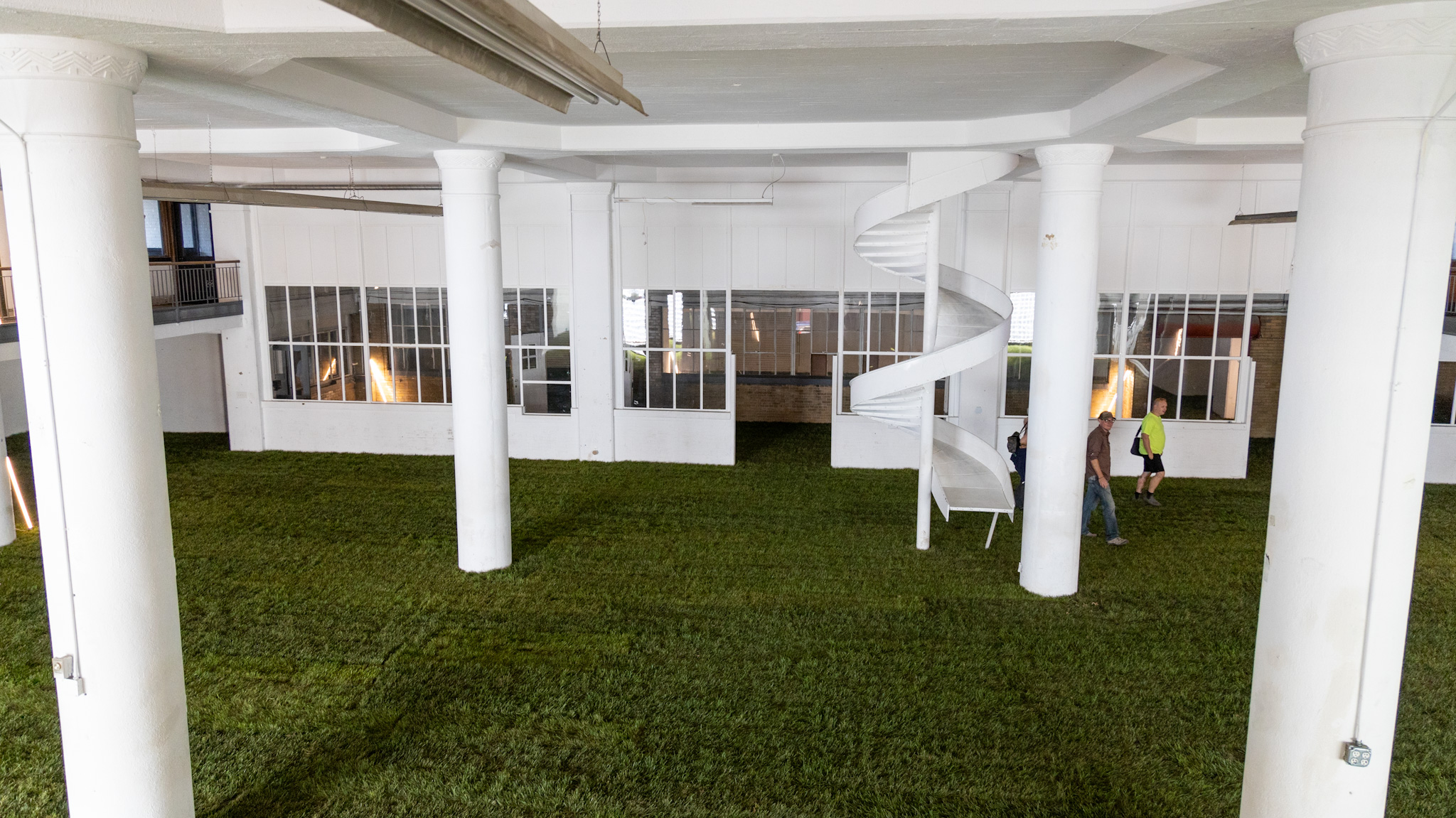 The grass set inside the Boyer Campbell Building in Detroit for the Petrichor botanical art installation on May 30, 2024. (Photo credit: Tayler Simpson, WDET)