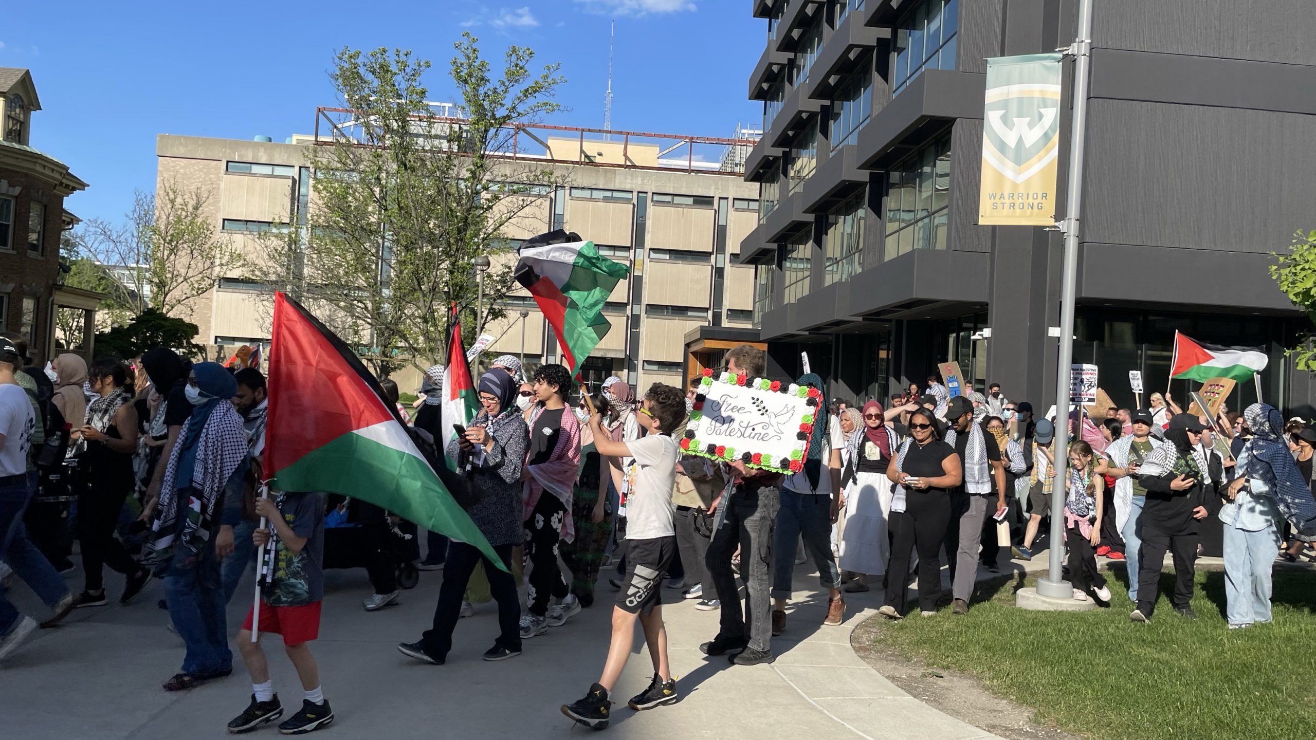 Pro-Palestinian protesters march along Wayne State University's campus in Detroit on May 23, 2024. (Photo credit: Nargis Rahman)