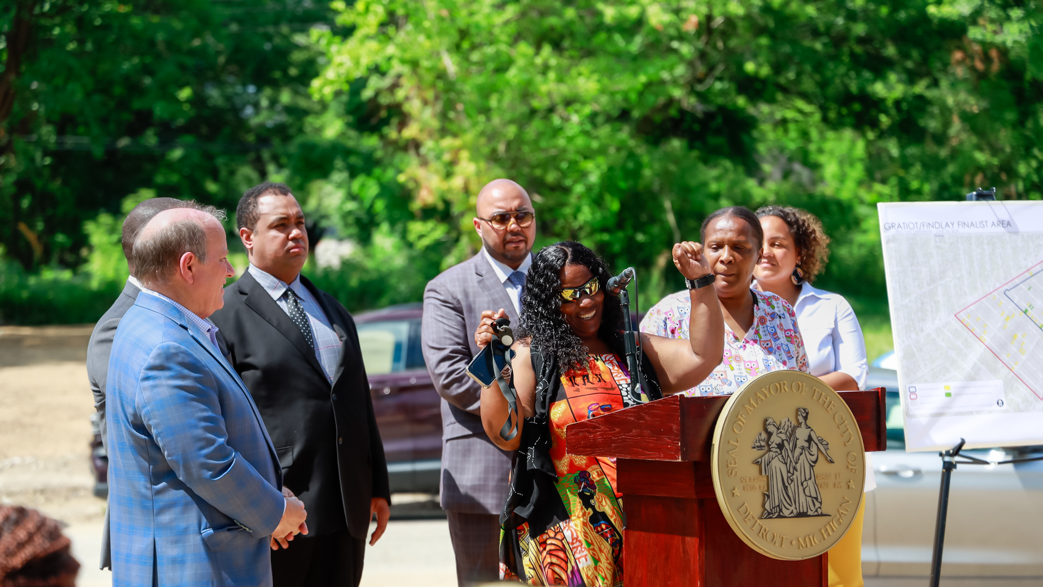 Residents share excitement with city officials for the new solar neighborhood plan at a press conference on Monday, June 24, 2024, in Detroit's Gratiot/Findlay neighborhood.