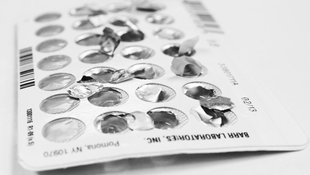 FILE - An empty pack of oral birth control pills.