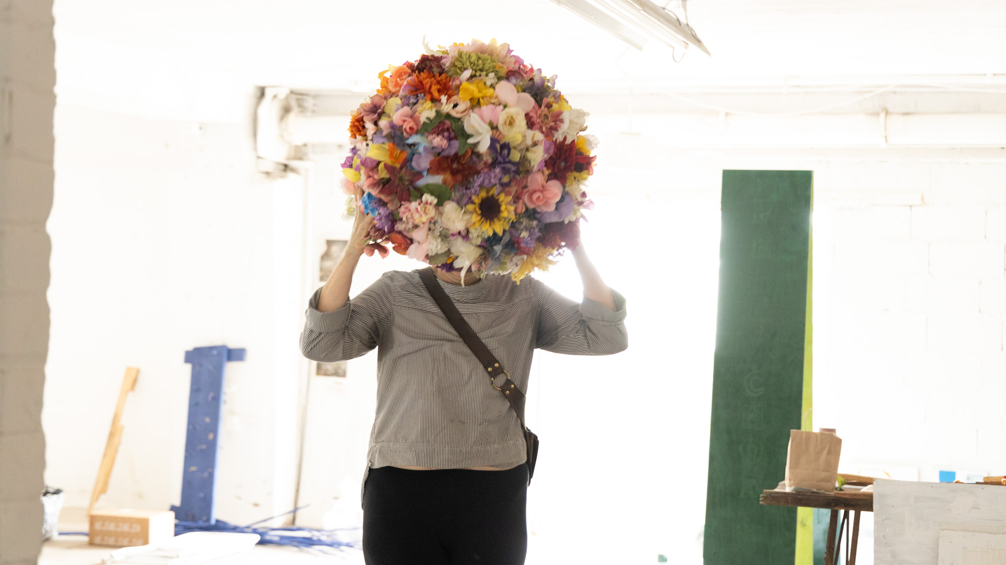 Lisa Waud wearing a flower headdress she created.