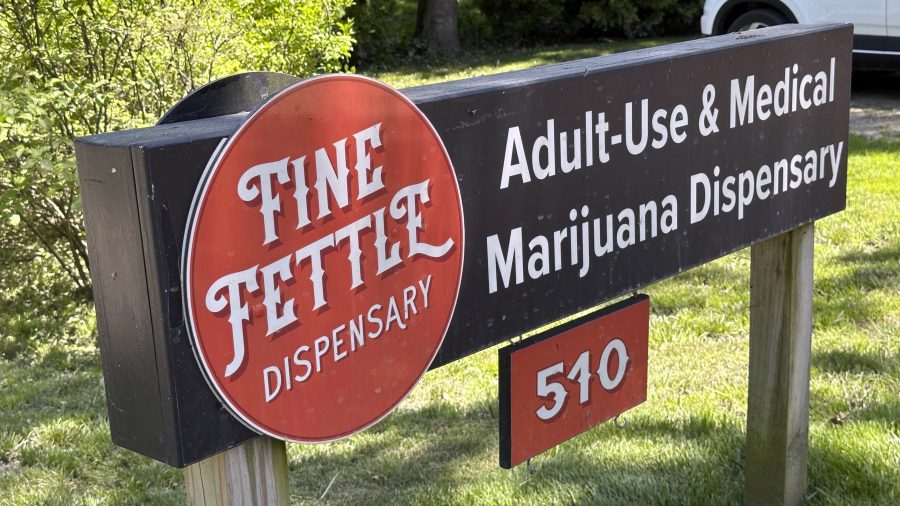 A sign advertises the Fine Fettle cannabis dispensary on June 4, 2024, in West Tisbury, Mass..
