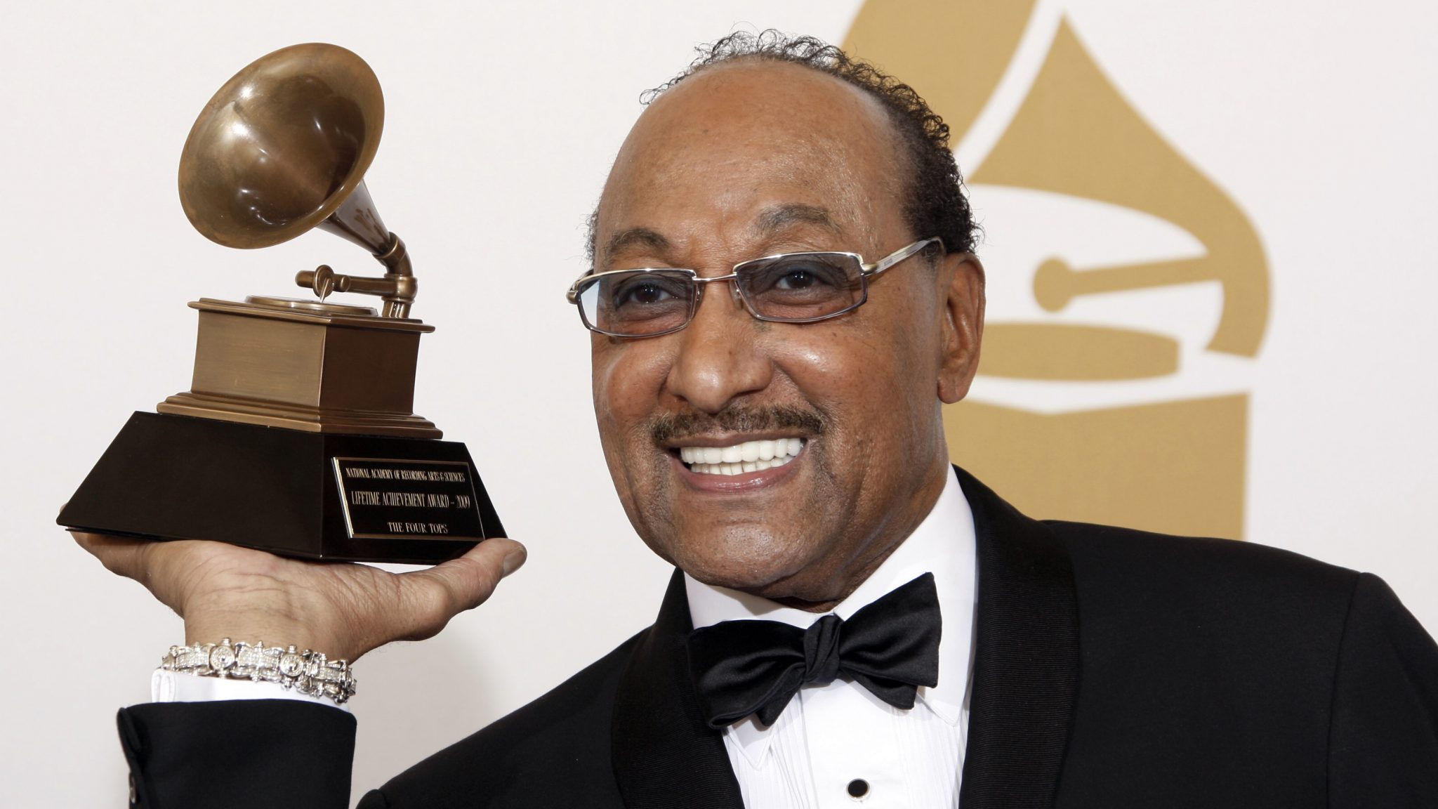 FILE - Duke Fakir holds his life time achievement award backstage at the 51st Annual Grammy Awards in Los Angeles on Feb. 8, 2009. Fakir wrote a memoir, "I'll Be There: My Life With The Four Tops." Fakir, the last of the original Four Tops, died Monday of heart failure at age 88.