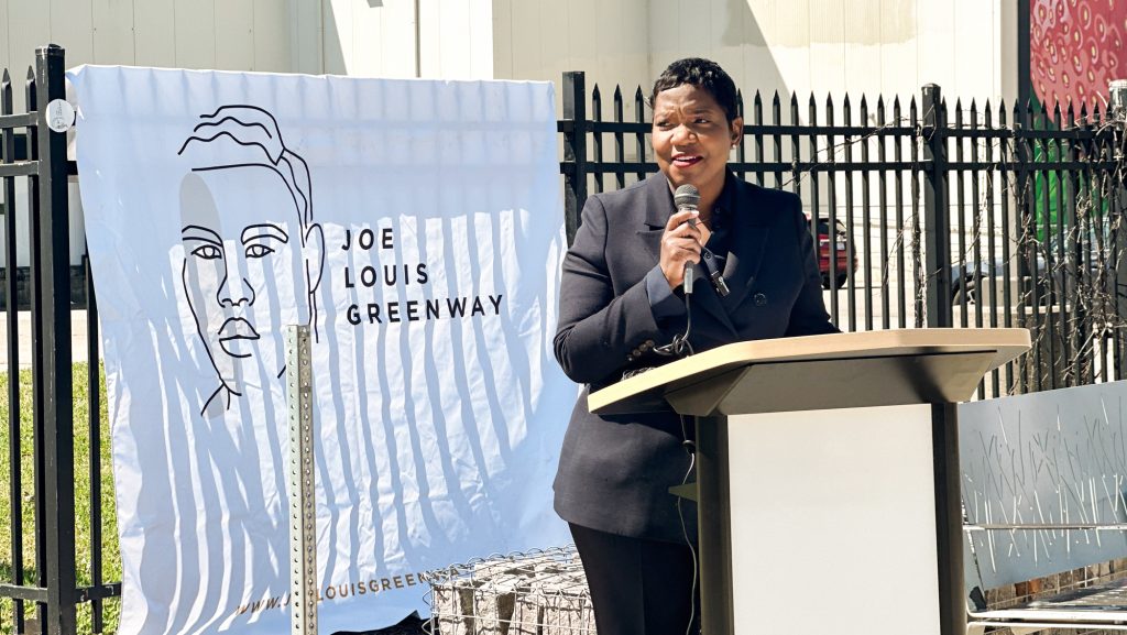 Leona Medley, executive director of the Joe Louis Greenway Partnership, discusses plans to connect the Joe Louis Greenway and Iron Belle Trail at an event on the Dequindre Cut, July 1, 2024.