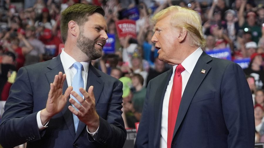 Republican presidential candidate former President Donald Trump and Republican vice presidential candidate Sen. JD Vance, R-Ohio, arrive a campaign rally, Saturday, July 20, 2024, in Grand Rapids, Mich. (AP Photo/Evan Vucci)