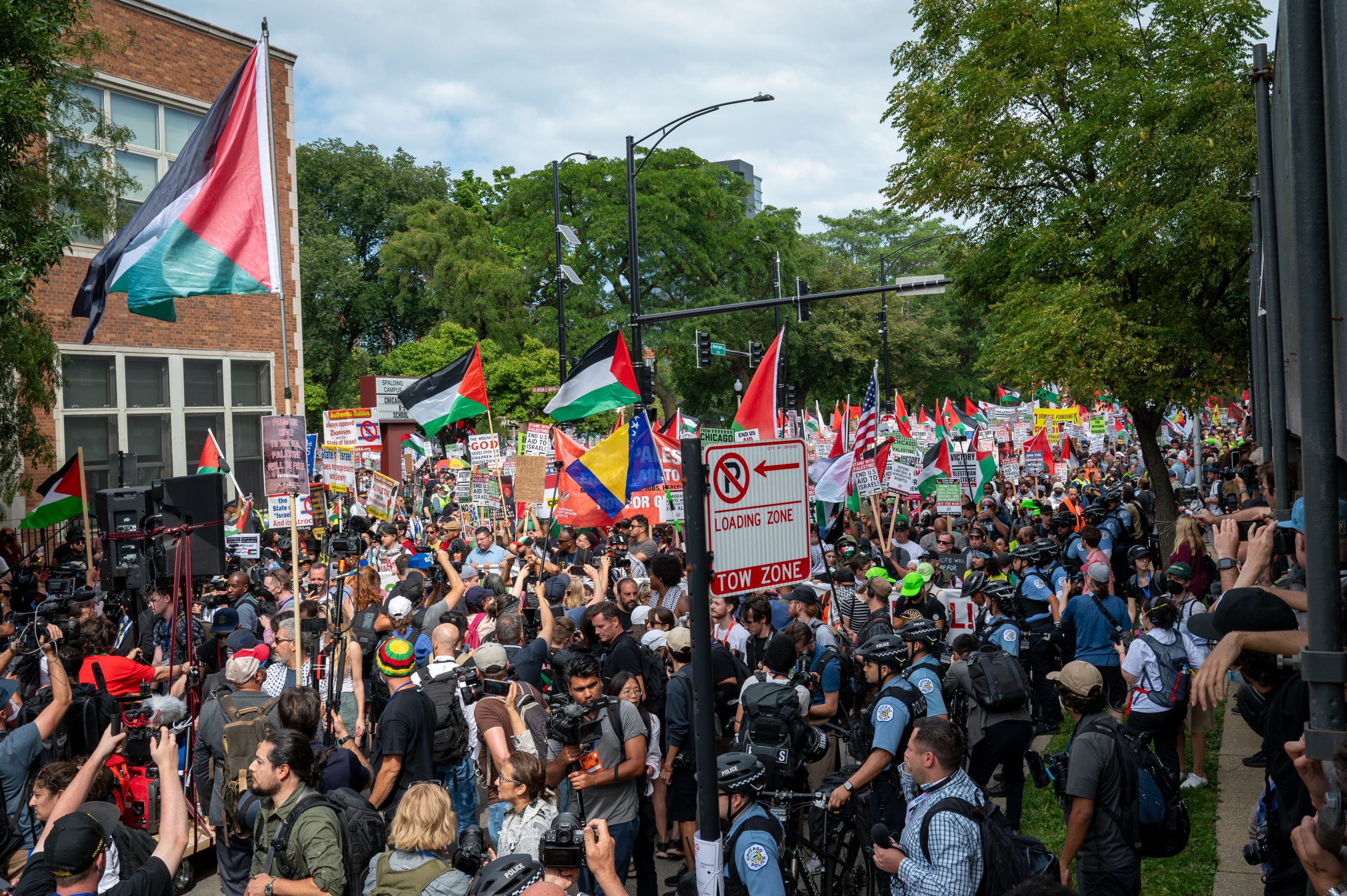 Pro-Palestinian and anti-war demonstrators march outside the Democratic National Convention in Chicago on Monday, Aug. 19, 2024.