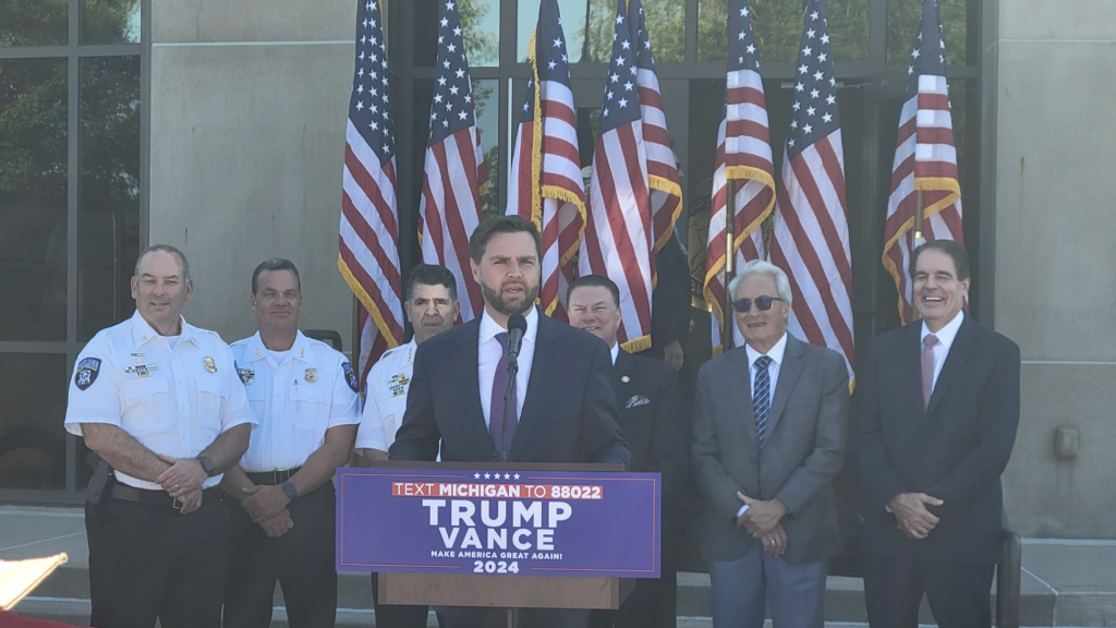 Republican vice presidential nominee J.D. Vance speaks at a press conference outside the Shelby Township Police Department in Macomb County on Wednesday, Aug. 7, 2024.