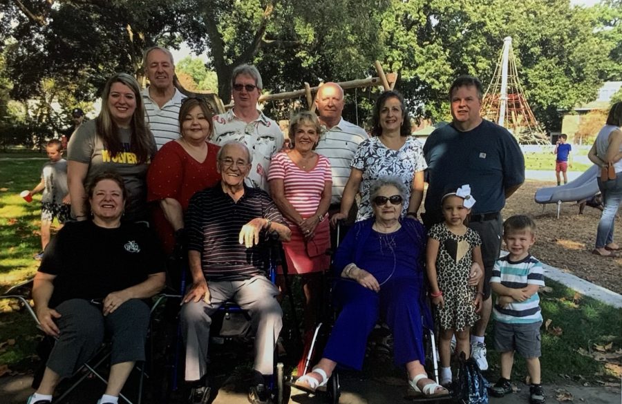 Mollicone's extended family, including WDET listener Theresa May, poses for a photo at Mollicone Park.