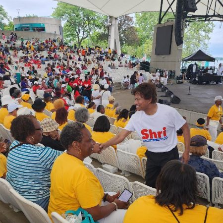 Shri Thanedar greets residents at a senior appreciation day outside Detroit’s Aretha Franklin auditorium