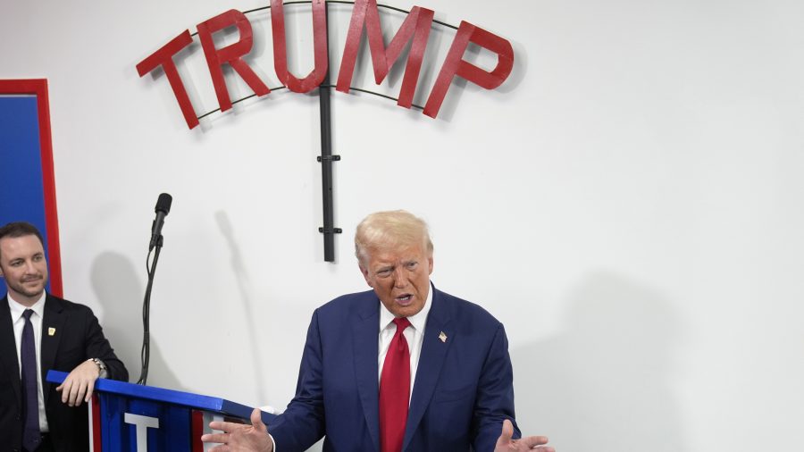 Republican presidential nominee former President Donald Trump speaks during a stop at a campaign office, Monday, Aug. 26, 2024, in Roseville, Mich.