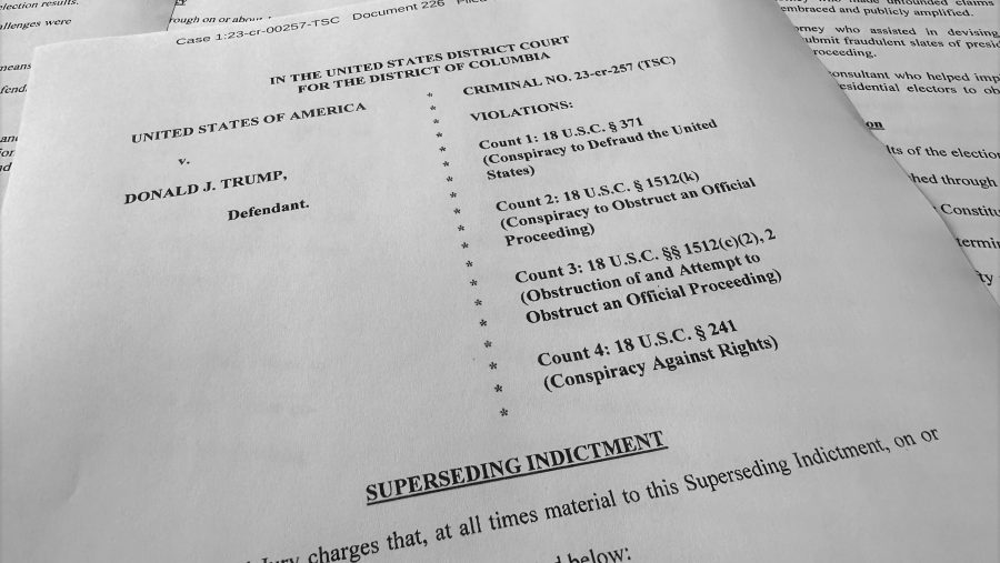 The superseding indictment against former President Donald Trump is photographed Tuesday, Aug. 27, 2024, after special counsel Jack Smith filed the new indictment against Trump that keeps the same criminal charges but narrows the allegations against him following a Supreme Court opinion conferring broad immunity on former presidents.