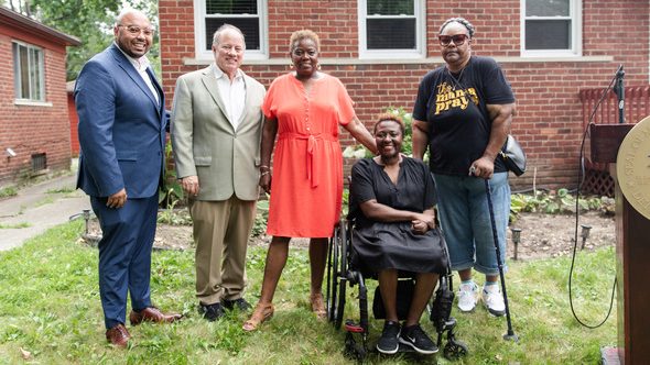 Councilmember Fred Durhal III (from left), Mayor Mike Duggan, Councilmember Mary Waters and Detroit Home Accessibility Program recipients Latasha Washington and Kim Cotton.