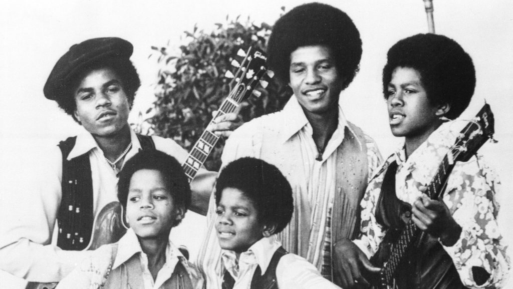 FILE - The Jackson 5, Michael Jackson, front right; Marlon Jackson, front left; Tito Jackson, back left; Jackie Jackson, back center; and Jermaine Jackson, back right; pose for this undated photo together in Los Angeles.