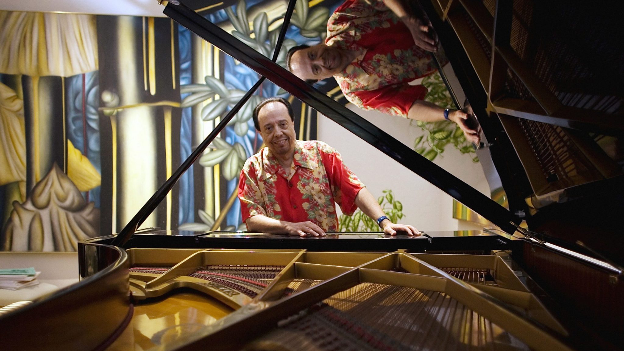 FILE - Bossa Nova piano maestro Sergio Mendes sits for a portrait at his home in Woodland Hills, Calif., on Feb. 7, 2006.