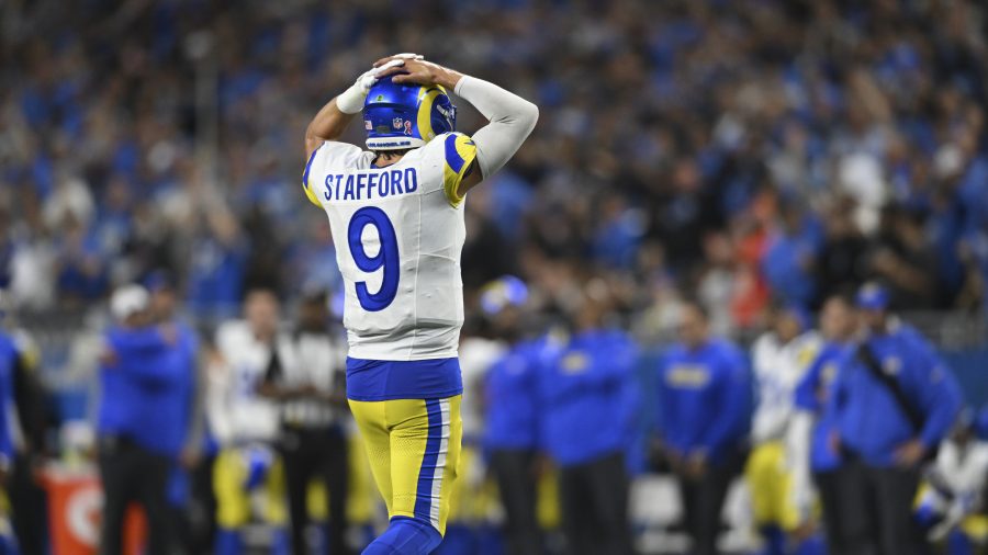 Los Angeles Rams quarterback Matthew Stafford (9) walks to the bench against the Detroit Lions during the second half of an NFL football game in Detroit, Sunday, Sept. 8, 2024.