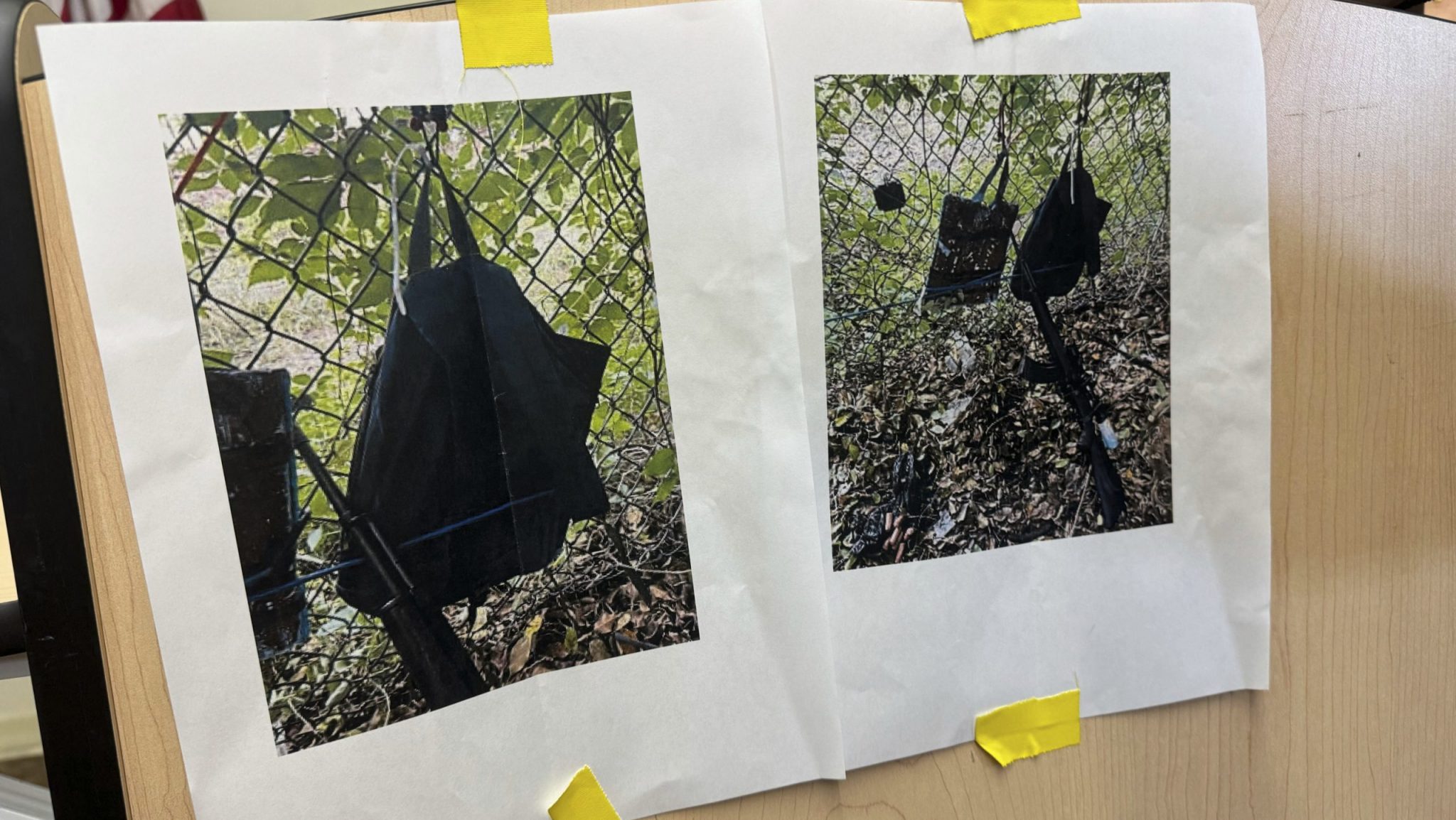 Photos that show an AK-47 rifle, a backpack and a Go-Pro camera on a fence outside Trump International Golf Club taken after an apparent assassination attempt of Republican presidential candidate former President Donald Trump, are displayed during a news conference at the Palm Beach County Main Library, Sunday. Sept. 15, 2024, in West Palm Beach, Fla.