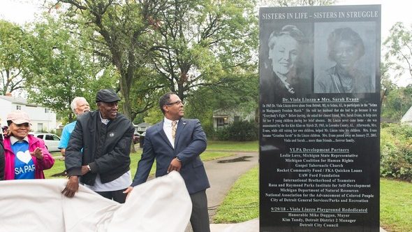 Detroit Deputy Mayor Todd Bettison (right) joins Viola Liuzzo Park Association President Artis Johnson and Elaine Steele, co-founder of Raymond & Rosa Parks Institute and family members in unveiling the new monument.