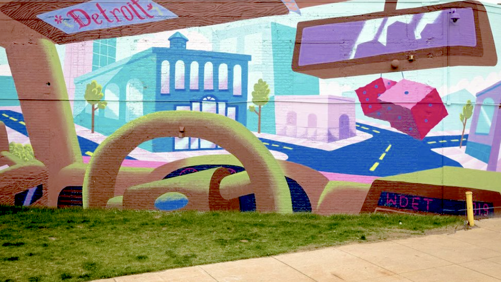 A mural on the corner of Broadway and Gratiot in Detroit by artist Michael Polakowski features WDET 101.9 FM on the dial.