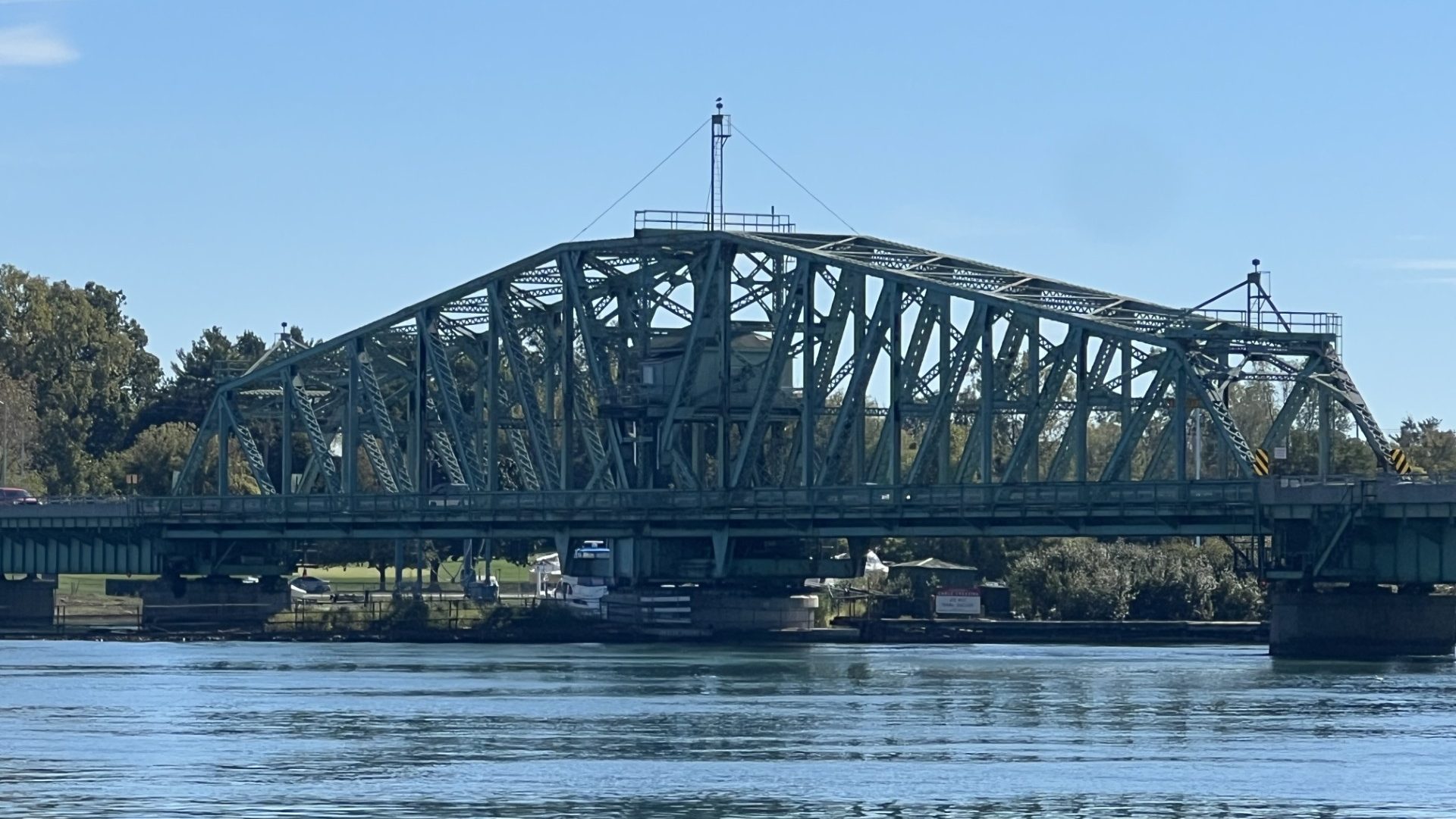 The Grosse Ile Parkway Bridge spans the Detroit River.