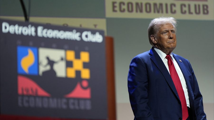 Republican presidential nominee former President Donald Trump arrives to speak at a meeting of the Detroit Economic Club, Thursday, Oct. 10, 2024, in Detroit.