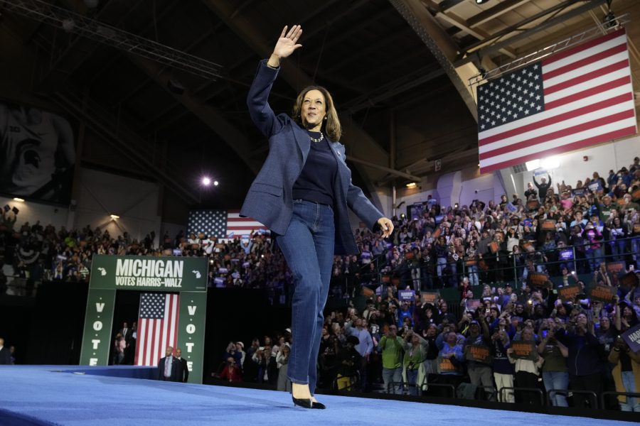 Democratic presidential nominee Vice President Kamala Harris arrives to speak during a campaign rally at Jenison Field House on the campus of Michigan State University, Sunday, Nov. 3, 2024, in East Lansing, Mich.