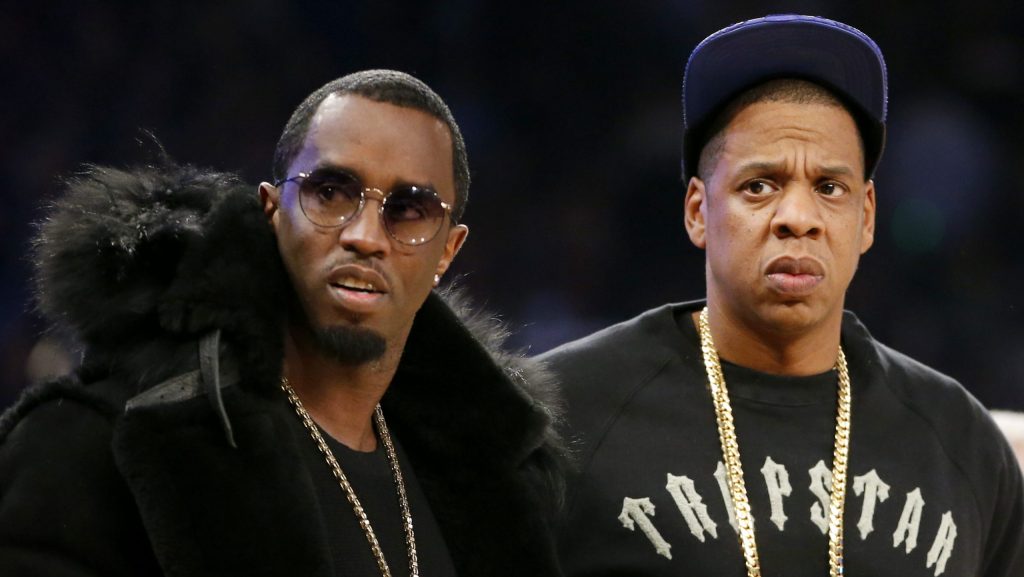 FILE - Rap moguls Sean "Diddy" Combs, left, and Jay-Z attend the NBA All-Star basketball game, Feb. 15, 2015, in New York.