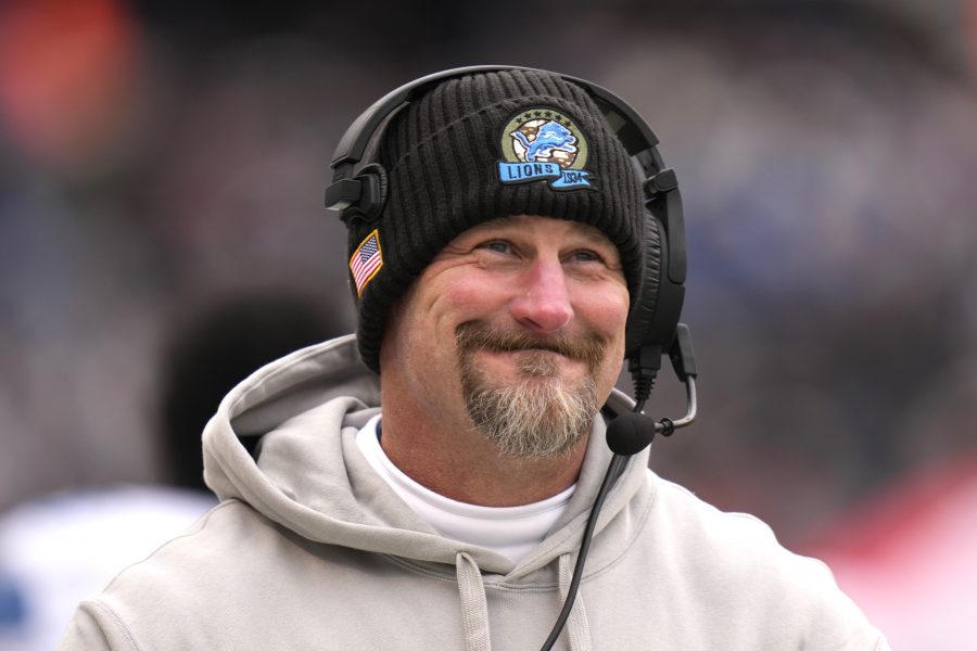 Detroit Lions head coach Dan Campbell smiles along the sidelines during the first half of an NFL football game against the Chicago Bears on Sunday, Dec. 22, 2024, in Chicago. 