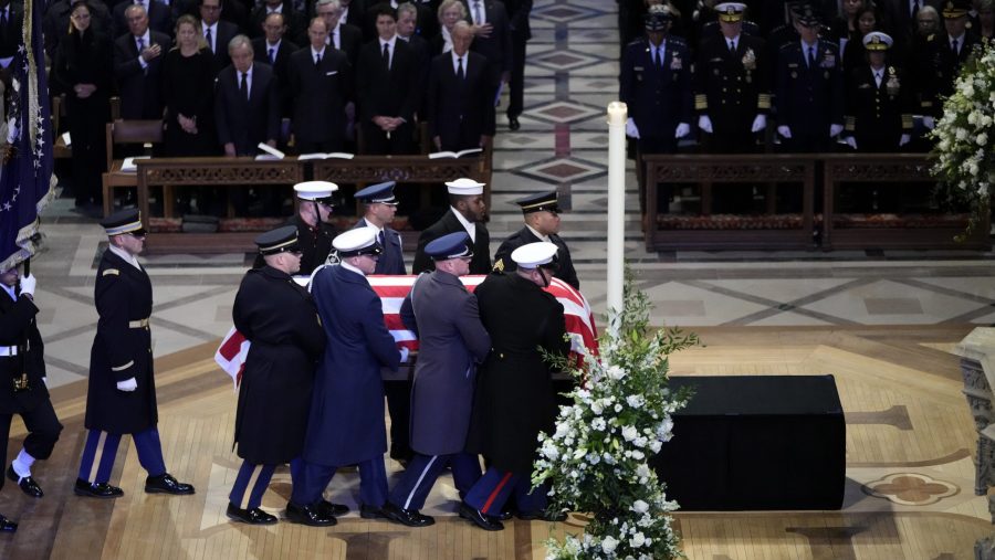 The flag-draped casket of former President Jimmy Carter arrives for a state funeral at Washington National Cathedral in Washington, Thursday, Jan. 9, 2025.